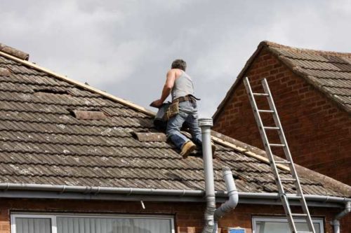Roofer working on a roof repair